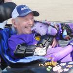 Myron Teterud, a longtime Sequim High sports fan, enjoys some gifts from Sequim Alumni Association members and friends in September 2020. He died in April 2021. Sequim Gazette photo by Michael Dashiell