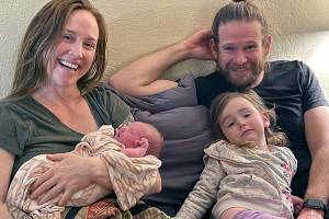 Indie Bo Bruner was born at home to Laura and Rusty Bruner of Port Angeles at 2:44 a.m. New Year's Day. She is seen here soon after the birth with her older sister, Ezie Wilder Bruner, by her side. (Mallorie Kirsch, LM CPM)