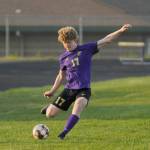 Sequim Gazette file photo by Michael Dashiell
Aidan Henninger, pictured here taking a free kick in Sequim High Schools 6-1 win over Olympic on April 19, 2021, has signed a letter of intent to play for NCAA Division III Franciscan University of Steubenville, Ohio.