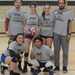 Team members of The Honest Touch celebrate a Peninsula Volleyball League A Division championship on Jan. 20. Pictured are (back row, from left) Kody McCracken, Kendra Abrams, Haleigh Mortelius and Lambros Rogers, with (front row, from left) Michelle Hernandez and Justin Hermosada. Not pictured is Devin Edwards.