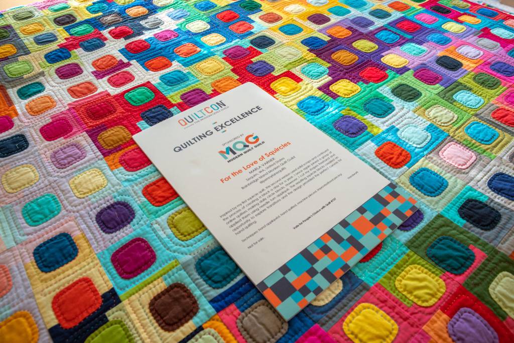 Above: A close-up of the details of Sequim resident Marla Varners quilt For the Love of Squircles, winner of the 2020 QuiltCon Quilting Excellence Award. Below: Crevices (40 x 45.5) will be shown at the upcoming QuiltCon in Phoenix.