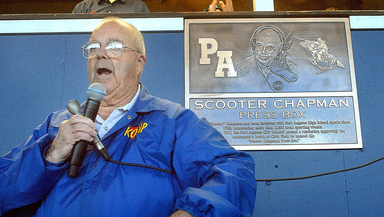 File photo by Keith Thorpe/Olympic Peninsula News Group
KONP Radio sportscaster Howard Scooter Chapman speaks to the crowd after the unveiling of a plaque naming the press booth at Port Angeles Civic field the Scooter Chapman Press Box in 2017. Chapman was honored at the beginning of Friday evenings Port Angeles High School football game for his involvement with high school sports since the 1950s.