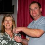 Dave McDaniels, Sequim Prairie Grange president, honors Kim Moulson for 45 years of membership with the Grange. Photo by Sherrie Cerutti