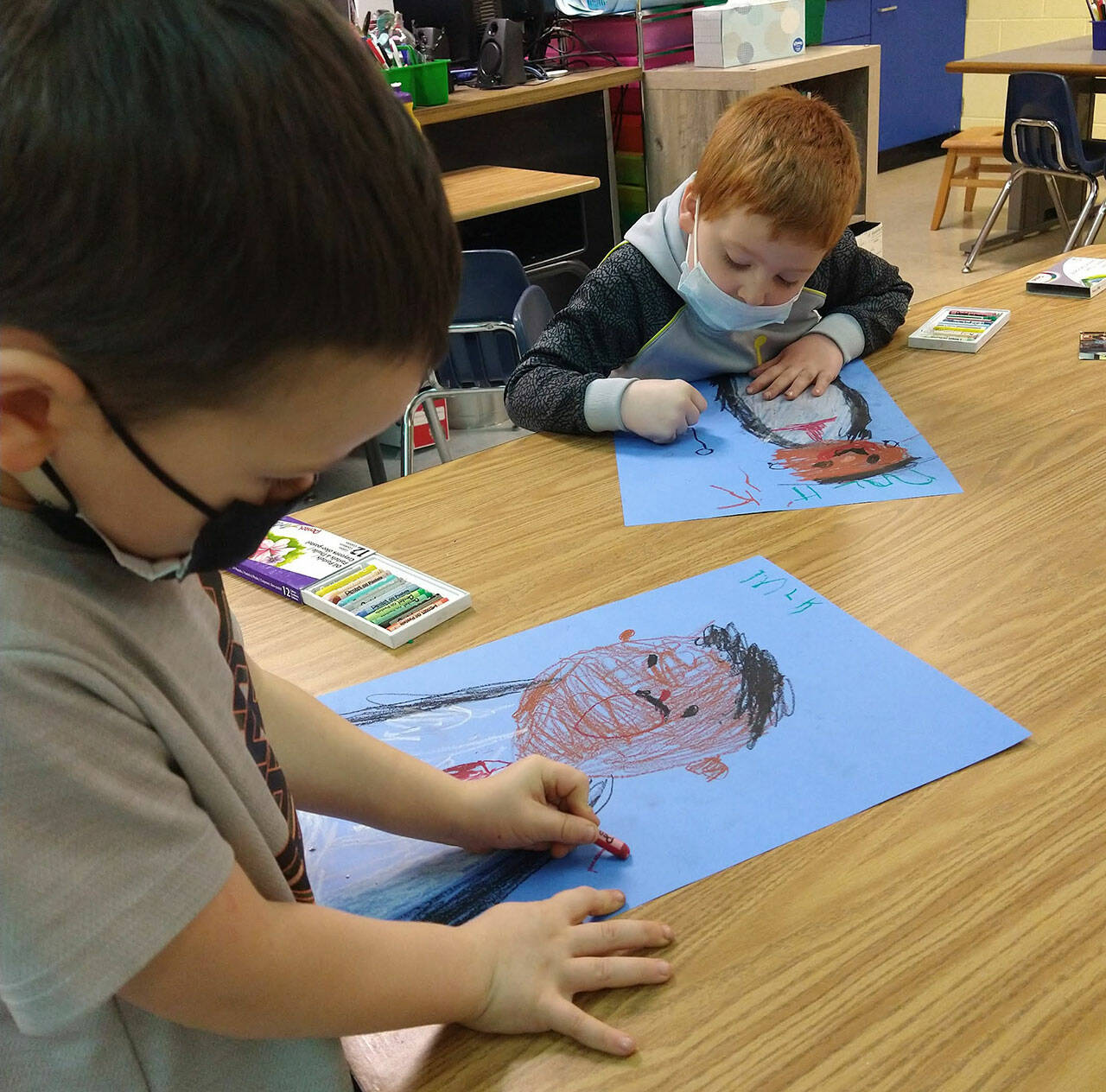 Kamden Larson and Riley Glen, kindergarteners in Lorrie Corders class at Helen Haller Elementary, work on a project as they celebrate Martin Luther King Jr. Day in January. Submitted photo