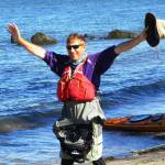 John Kuntz celebrates finishing a 1,250-mile journey on the Columbia River in 2018. Kunts presents the third of the 2022 Travelers Journal series on March 17 with Eris Adventure, Kayaking the Mighty Columbia River from Source to Sea. Submitted photo
