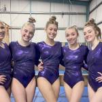 Sequim High gymnasts (from left) Ellie Turner, Alex Schmadeke, Amara Brown, Susannah Sharp and Danica Pierson take a break from competition at the 2A/3A South Sound Conference-Olympic League sub-district meet in Puyallup on Feb. 10. Submitted photo