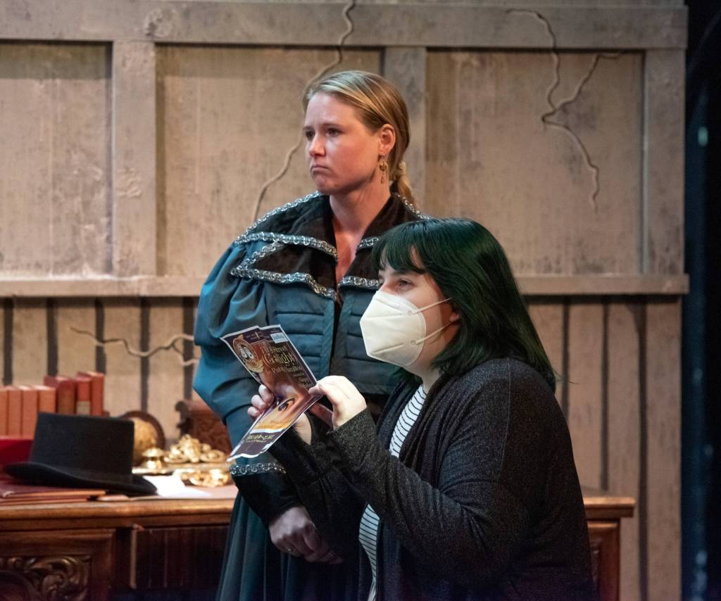Director Ginny Holladay talks props at a rehearsal of Angel Street at Olympic Theatre Arts in Sequim. Behind her stands Sierra Brittal, one of two Bella Manninghams. Sequim Gazette photo by Emily Matthiessen