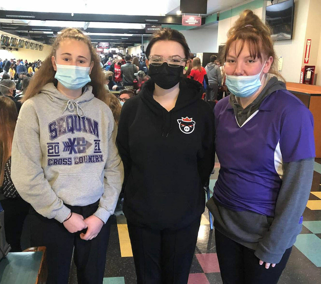 Photo courtesy of Randy Perry
Sequim High bowlers pause from the action at the West Central District tourney in Parkland last weekend. Pictured, from left, are Nikoline Updike, Madison McKeown and Morgan Tate. Updike and McKeown qualified for the state tourney.