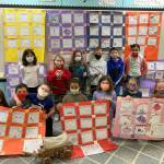 Second-grade students in Renee Mullikins Helen Haller Elementary class work on a social studies unit about Westward Expansion. Students used their pictures and notes to create a story quilt to teach their families.