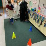 From left, third-grade students Isaac Malkasian, Bristol Bury and Kyrie Marchbanks play a multiplication game in a lesson about ancient Rome in Emily Ellefsons Helen Haller Elementary class. Submitted photo