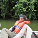 Boat riders watch for wildlife on the Tortuguero Lagoon. Photo by Mike Barton
