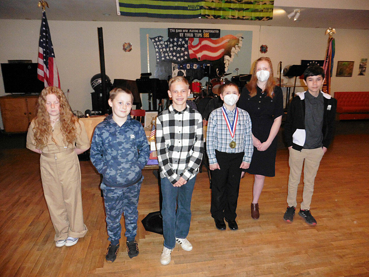 Submitted photo
Student essay winners at the Sequim VFW Post 4760, VFW District 14, and Washington state level, included, from left, Anna Miller, Robert Fickett, Kolby Helvey, Gideon Hales, Anabrie Hales, and Nigel Barclay. Not pictured: Kalob Helvey and Arora Himmelberger.