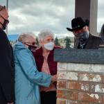 Submitted photo
Members of Trinity United Methodist Church attend a special anointing and blessing ceremony at the church on Feb. 27. Marilyn Siebens, left, and Marilyn Derau, who led the effort to reactivate the bell, prepare to give it its first ring