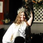 Sequim Gazette photo by Matthew Nash Last years festival queen Hannah Hampton waves goodbye during the farewell speech.