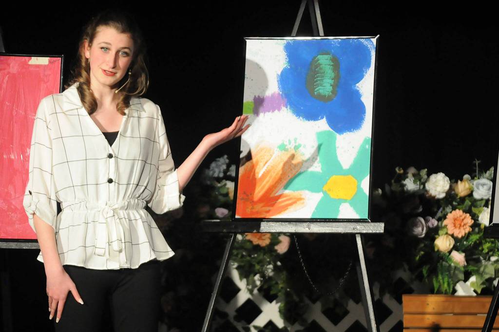 Sequim Gazette photo by Matthew Nash Katherine Gould speaks about her love of art through life as her creative display.