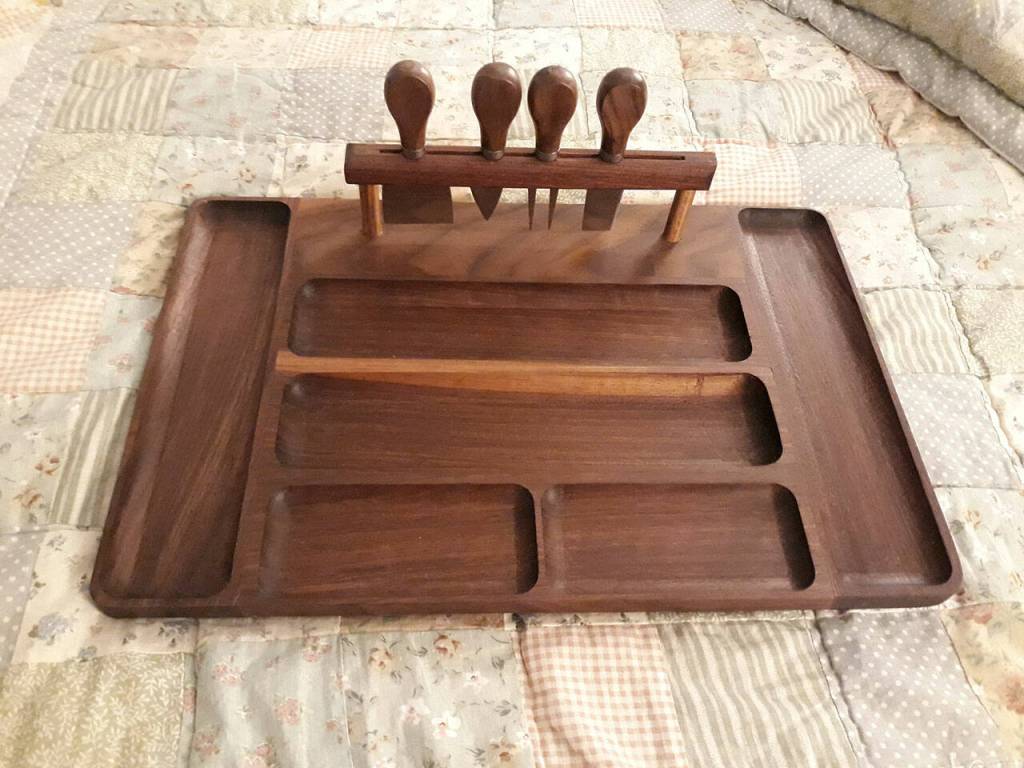 This wooden serving tray and utensils was designed and made by master wood craftsman Jack Tatom of Sequim. Tatom donates many of his wooden pieces to local charities and has included this piece in the raffle at the Clallam County Gem & Mineral Associations annual Rock, Gem & Jewelry Show on March 19-
20 in Port Angeles.