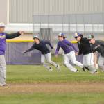 Sequim Gazette photo by MichAel Dashiell
Sequim High baseball players work on reading pitcher moves, led by SHS head coach Dave Ditlefsen, left, at a preseason practice in early March.