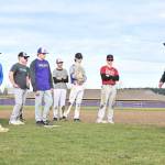 Sequim High baseball head coach Dave Ditlefsen, right, talks with players at a preseason practice in early March. Sequim Gazette photo by Michel Dashiell