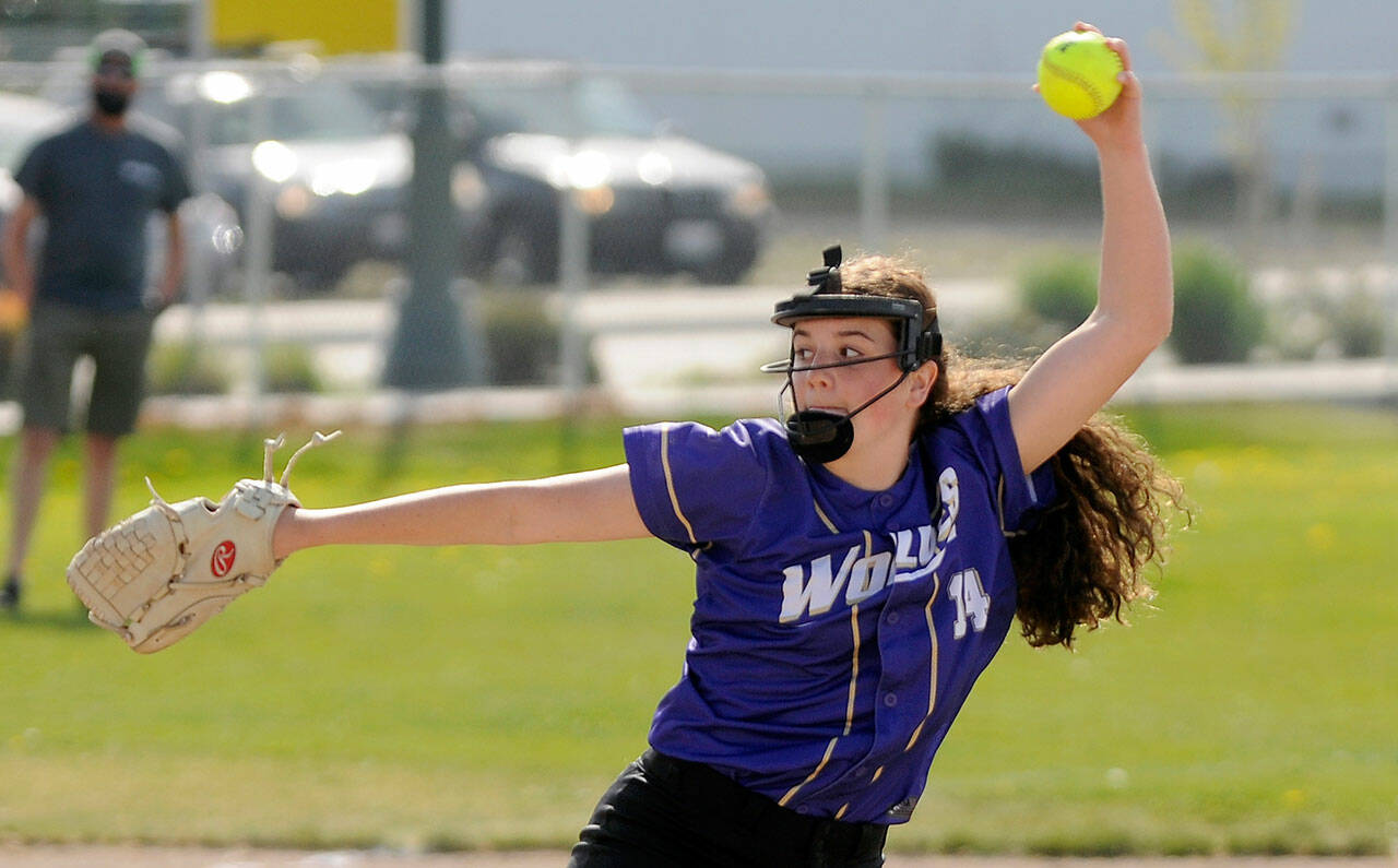 Sequims Lainy Vig pitches against North Kitsap in a league match-up in April 2021.