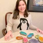 Photo courtesy of Helen Motokane
Christine Motokane displays some of the painted rocks she plans to place in public areas around Sequim and Port Angeles. Motokane is a self-advocate with autism, author of the memoir Working the Double Shift: A Young Womans Journey with Autism, a college graduate and a paraeducator.