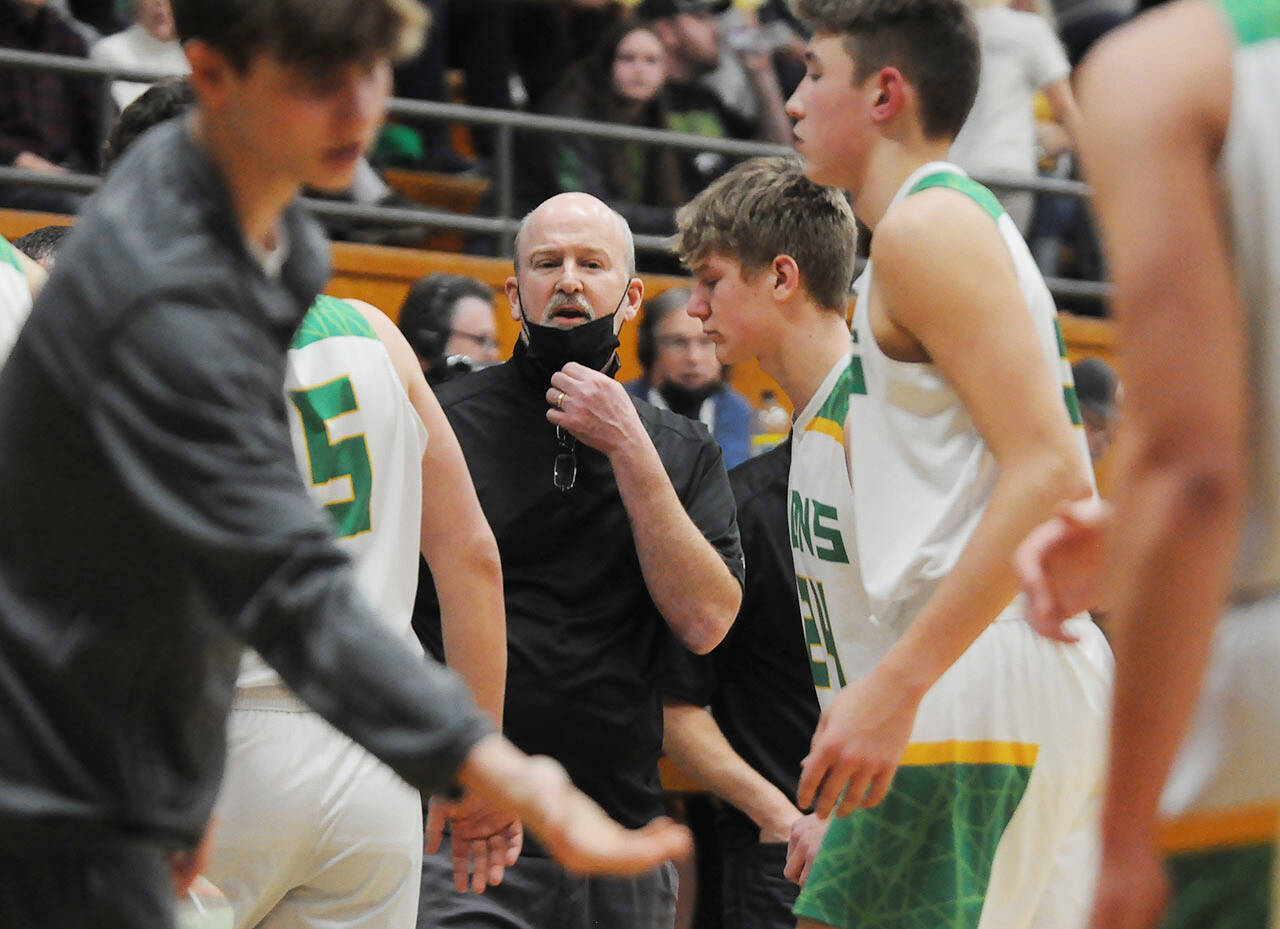 Sequim Gazette photo by Michael Dashiell
Former Sequim High basketball coach, Brian Roper, readies his Lynden Lions for a regional game against Port Angeles on Feb. 25 at Mount Vernon High School. Roper won his fifth 2A state title with the Lions on March 5 with a win over Pullman.
