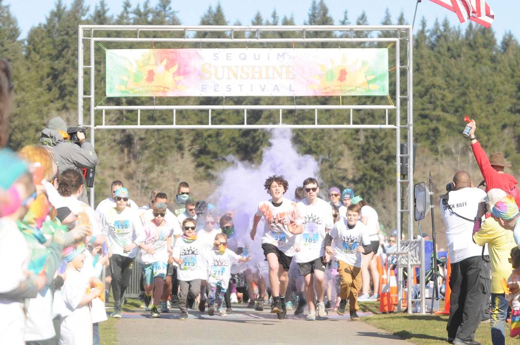 Sequim Gazette photo by Michael Dashiell
Runners and walker break from the start of the Sun Fun Color Run 5k Saturday morning at the Albert Haller Playfields just north of Carrie Blake Community Park. More than 500 participants were registered.