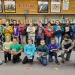 Courtesy photos
Helen Haller Elementarys Battle of the Books club prep to read The Cardboard Kingdom, the final book in the annual challenge.