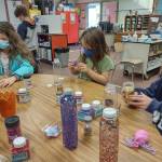 Students (from left) Natalie Tripp, Evelynn Moose and Isabel Lawson create calming glitter bottles in Heather Rileys class at Helen Haller Elementary School. Submitted photo