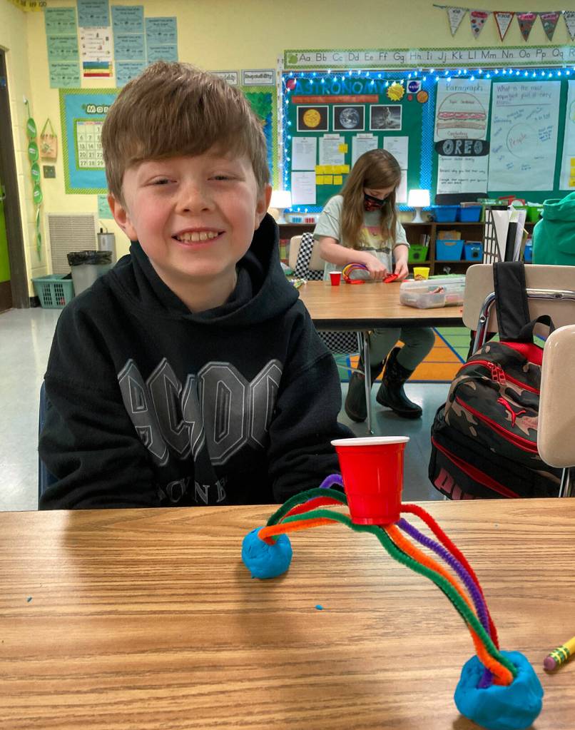 Aiden Fazio, a third-grader in Emily Ellefsons class at Helen Haller Elementary, displays his rainbow bridge. Submitted photo