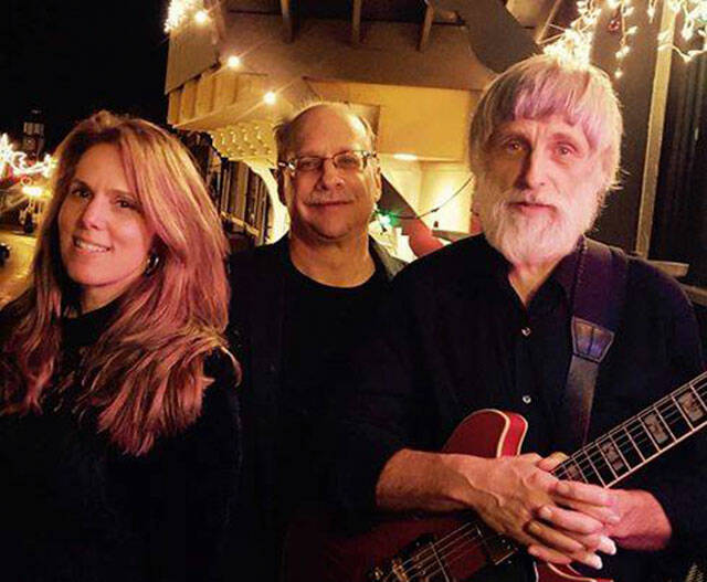 After a two-year hiatus, the Jenny Davis Trio returns for a concert set for 6-8 p.m. Saturday, April 2, at Wind Rose Cellars in Sequim. Pictured are, from left, Jenny Davis, Ted Enderle and Chuck Easton.