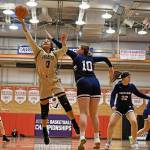Peninsulas Ituau Tuisaula (13) drives past Portlands Iris Cubit in an NWAC tournament quarterfinal game on March 20. Tuisaula led PC with 21 points as the Pirates edged Portland, 64-59.