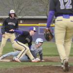 Sequim shortstop Conor Bear puts the tag on a Bainbridge runner in the first inning of the Wolves league match with with the Spartans on March 15. Teammates Jaxson Gray (foreground) and Marshall Phipps look on. Sequim Gazette photo by Michael Dashiell