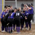 Sequim Gazette photos by Michael Dashiell
Above: Sequim teammates celebrate Amelia Pozernicks home run in the Wolves 12-0 rout of visiting 1A Forks on March 18. 
Right: Sequim pitcher Angel Wagner shuts out the Forks Spartans on March 18, a 12-0 Wolves non-league win