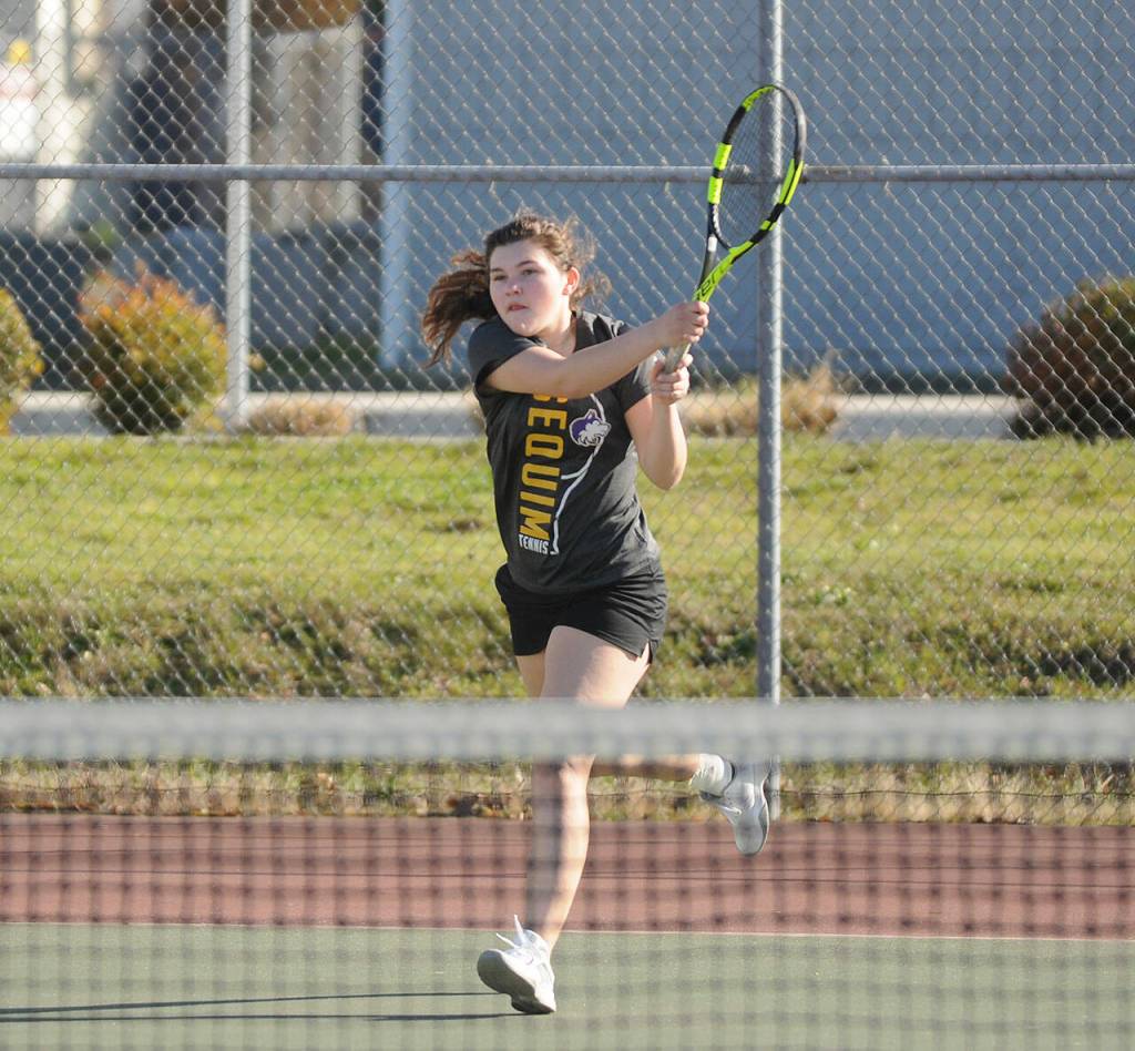 Sequims Allie Gale returns a shot against North Masons Meagan Johnson on March 22. Gale won in straight sets, 6-0 and 6-1. Sequim Gazette photo by Michael Dashiell