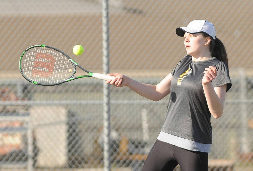 Danielle Herman returns a shot in the Wolves 7-0 sweep of North Mason on March 22. Sequim gazette photo by Michael Dashiell