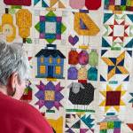 Sequim Gazette photo by Matthew Nash/ Down on the Farm was pieced together by Bonnie Filgo, quilted by Dory Miller and finished by Bonnie Cauffman. It was lots of fun, Filgo said, including images of farm life, such as images of canning supplies, fruit, a milk can, thread, a barn and more.