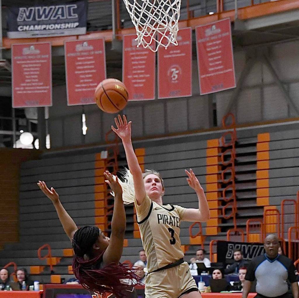 Peninsulas Millie Long drives to the basket in the Pirates 67-61 NWAC semi-final win over Clackamas on March 26. Photo by Jay Cline/Peninsula College