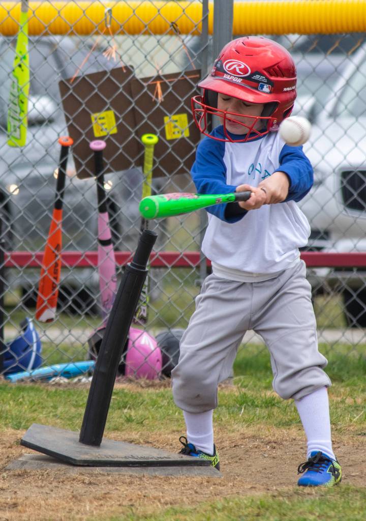 Kai Hill, 4, hits the first run of the T-Ball 2022 season at Dr James Standard Park on Silberhorn in Sequim. Sequim Gazette photo by Emily Matthiessen
