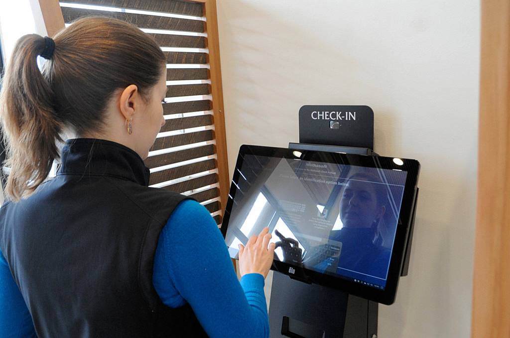 Sequim Gazette photo by Matthew Nash
Molly Martin, executive director of Healing Clinic, demonstrates the check-in system.