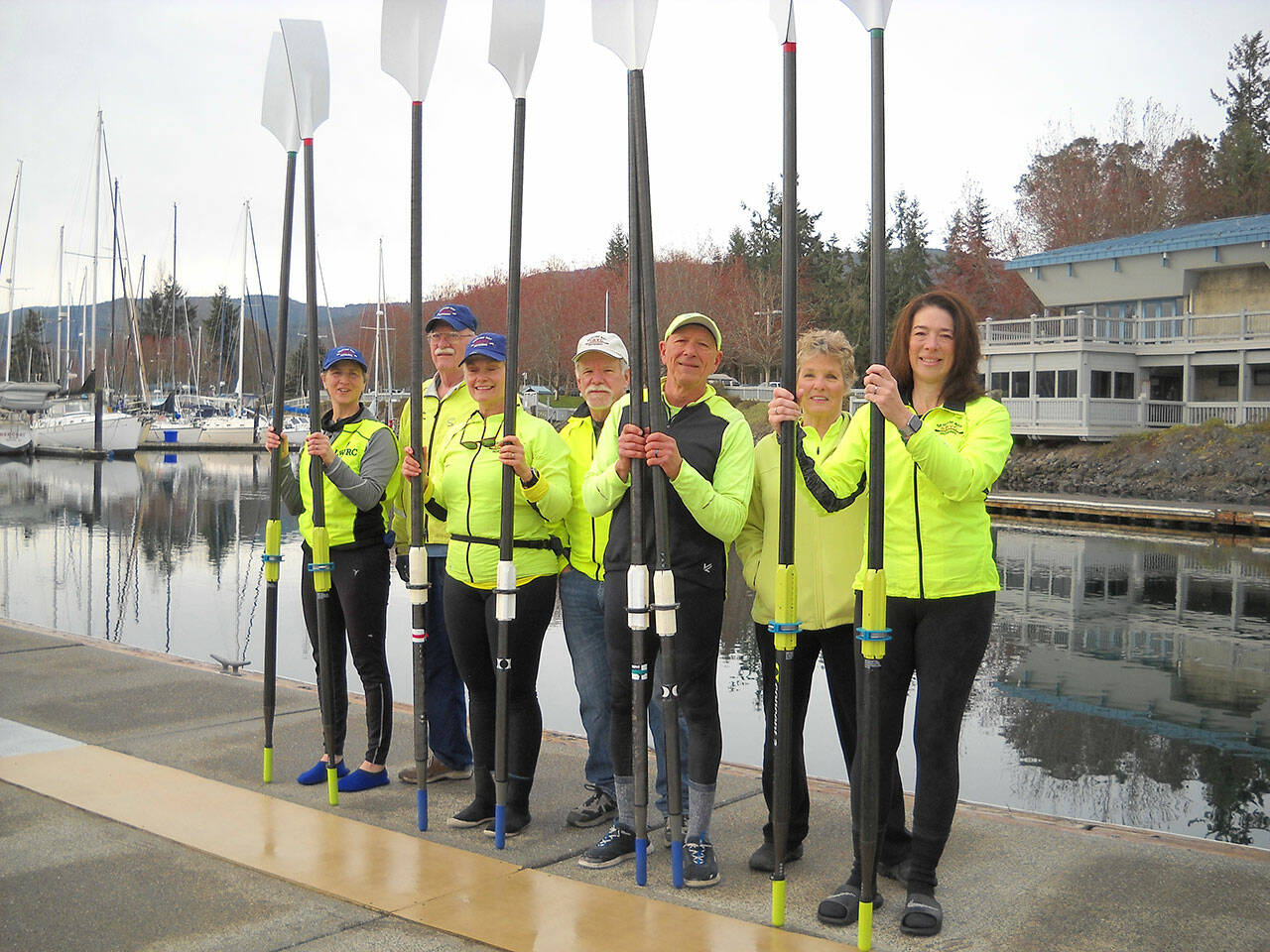 Sequim Bay Yacht Club rowers will host free rowing tryouts on April 24 at John Wayne Marina. Pictured, from left, are Jeanne Neal, Ted Shanks, Carolyn DeSalvo, Dennis Miller, Frank DeSalvo, Deborah Carlson and Amy Holms. Photo by Linda Carlson