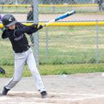 Coal Seamands, 12, hits the first ball of the first game of the Sequim Little League Majors on opening day of the 2022 season on March 26.