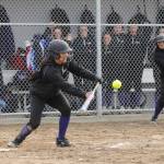 Sequims Taylee Rome lays down a successful bunt in Sequims 8-6 Olympic League loss to North Kitsap on March 29. Sequim Gazette photo by Michael Dashiell