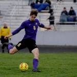 Sequims Brandon Wagner looks for an open teammate downfield in the first half of a 3-0 home loss to Bainbridge on March 29. Sequim Gazette photo by Michael
