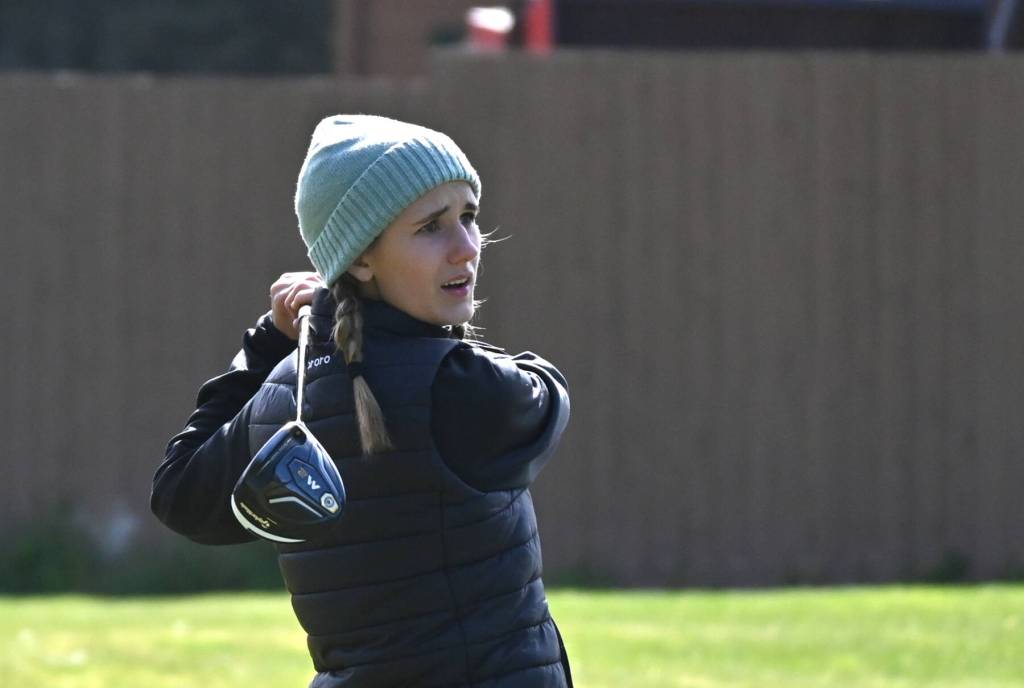 Sequim Gazette photo by Michael Dashiell
Sequims Hannah Wagner watches her drive at the second hole at The Cedars at Dungeness on March 31.