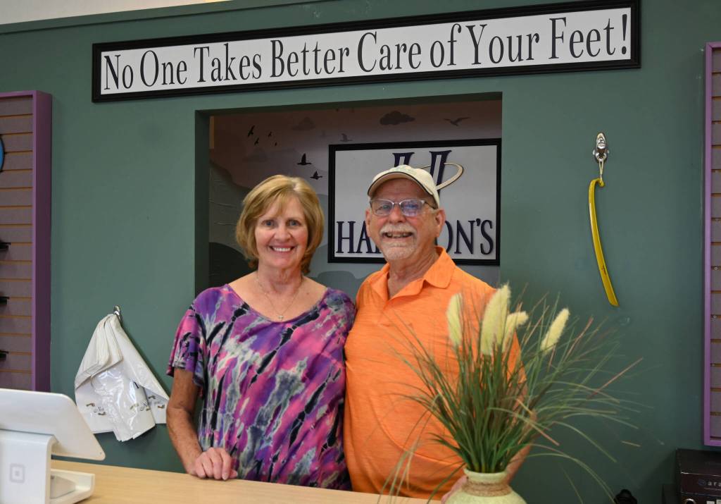 Sequim Gazette photo by Michael Dashiell
End of an era: Donna and Jon Harrison of Harrisons Comfort Footwear are retiring, with ownership of the popular shoe store moving over to Becks Shoes this week.