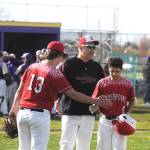 Crosspoint Academy head coach Derrin Doty, a former Sequim High standout, talks with his players in an April 15 non-league match-up in Sequim. Sequim Gazette photo by Michael Dashiell