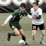 Port Angeles Keane McClain, left, and Sequims Rafael Flores battle for the ball on March 12 at Peninsula College in Port Angeles. Photo by Keith Thorpe/Olympic Peninsula News Group
