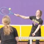 Sequim Gazette photo by Michael Dashiell
Sequims Malory Morey, right, returns a shot in a doubles match against North Kitsap on April 14 in Sequim. Morey and doubles partner Jordan Hegvedt downed North Kitsaps Amber Amos and Kate Ryan, 6-3 and 6-2.