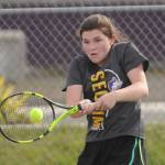 Sequims Allie Gale returns a shot against North Kitsaps Teegan DeVries in an April 14 league match.