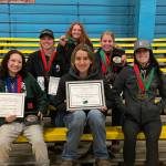 Sequim and Port Angeles equestrian team members celebrate a District 4 small team title in Grays Harbor earlier this month. Pictured are (in back) Joanna Seelye of Sequim, (middle row, from left) Maggie Anderson of Port Angeles and Libby Swanberg of Sequim, with (front row, from left) Port Angeles’ Sydney Hutton, Sequim’s Mia Kirner and Port Angeles’ Haley Bishop. Submitted photo